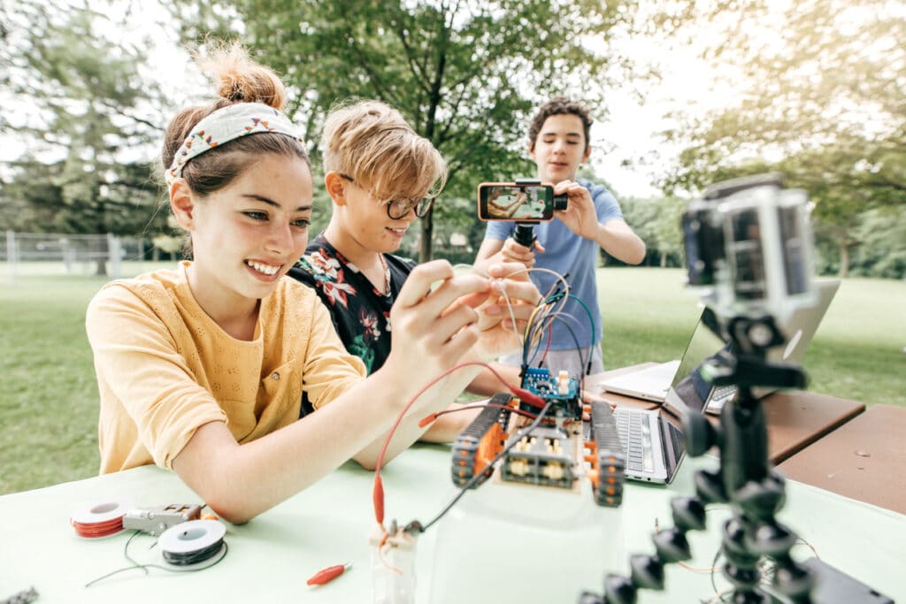 Teens working on robotics project