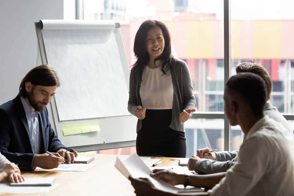 Woman leading a meeting with colleagues